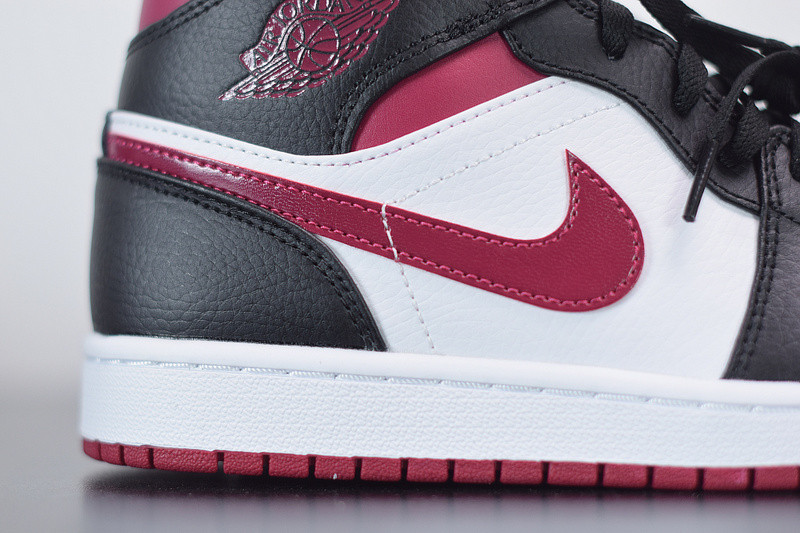 air jordan 1 mid resembles the “bred toe” 554724-066